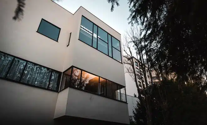 brown concrete building near trees during daytime